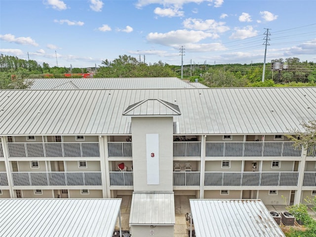 view of property featuring central air condition unit