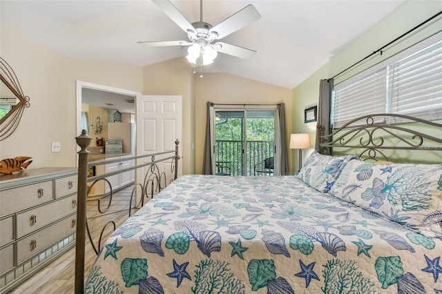 bedroom featuring lofted ceiling, access to outside, wood finished floors, and a ceiling fan