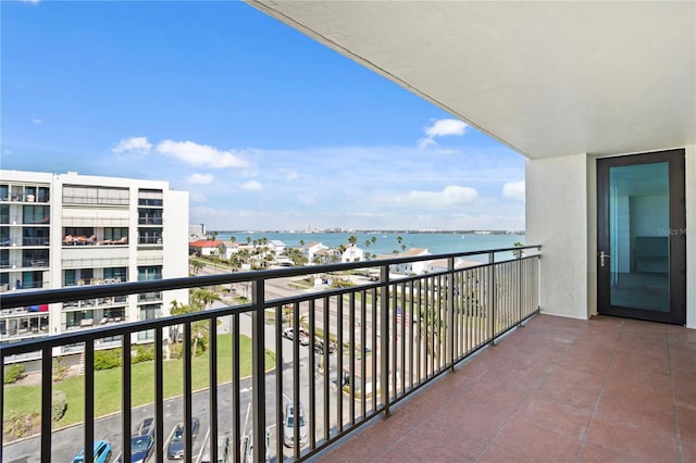 balcony featuring a water view