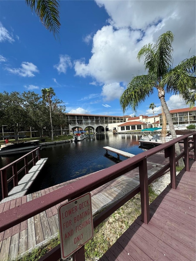 dock area with a water view