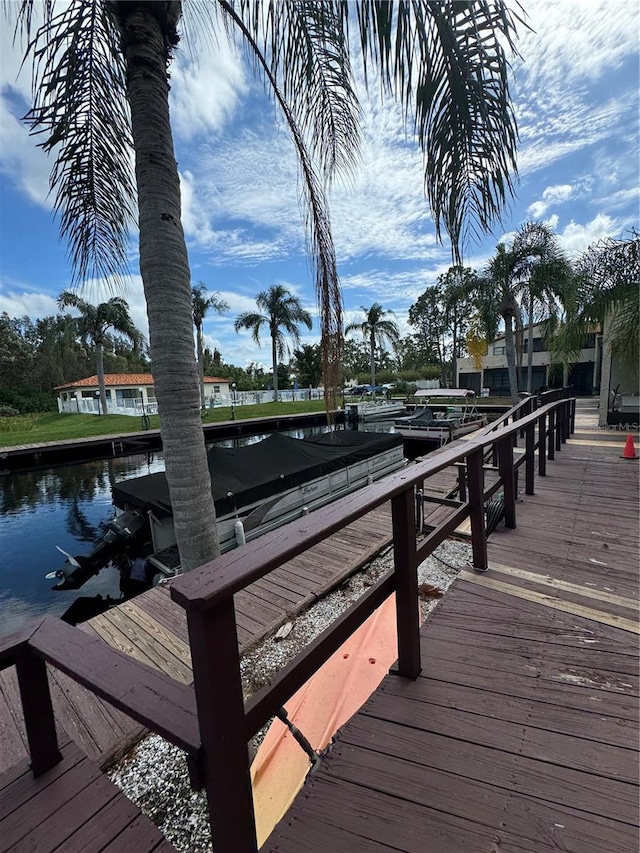 dock area featuring a water view