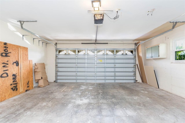 garage featuring a garage door opener