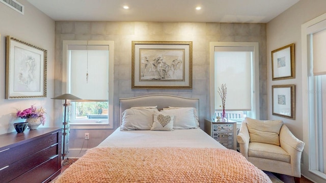 bedroom featuring visible vents and recessed lighting