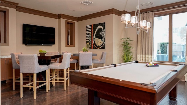 recreation room featuring visible vents, ornamental molding, dark wood-type flooring, a notable chandelier, and recessed lighting