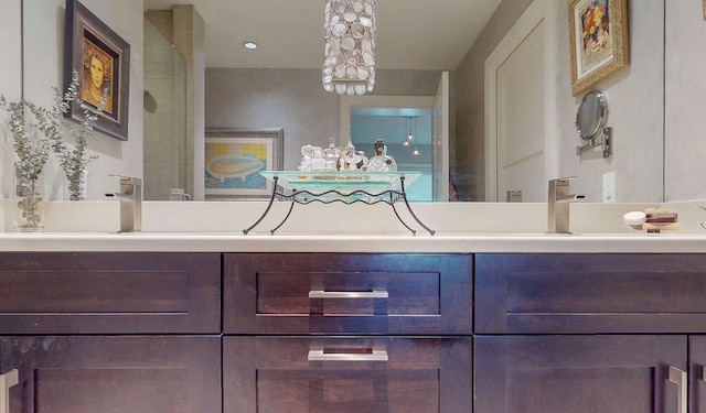 bathroom with double vanity and a sink