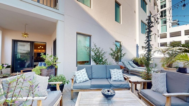 146 4th Ave NE Unit 204, Saint Petersburg, FL 33701 - view of patio featuring an outdoor living space