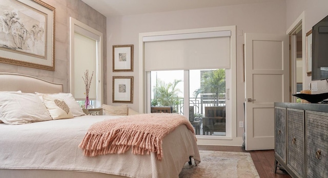 146 4th Ave NE Unit 204, Saint Petersburg, FL 33701 - bedroom with access to outside and wood finished floors