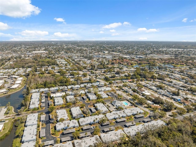 birds eye view of property featuring a residential view and a water view