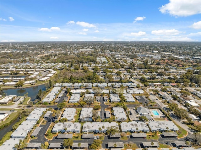 aerial view with a water view and a residential view