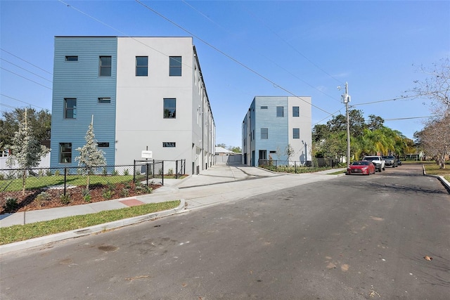 view of road featuring sidewalks and curbs