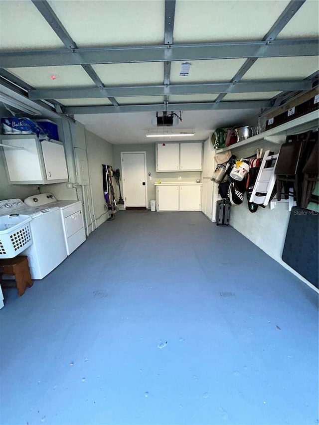 garage featuring a garage door opener and washing machine and dryer