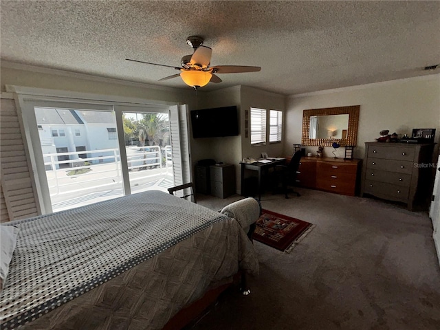 carpeted bedroom with a textured ceiling, access to exterior, a ceiling fan, and crown molding