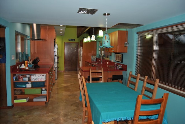 dining room featuring visible vents