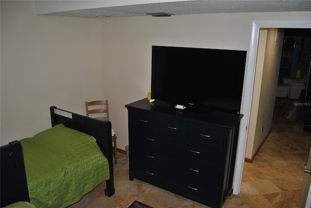 bedroom with baseboards