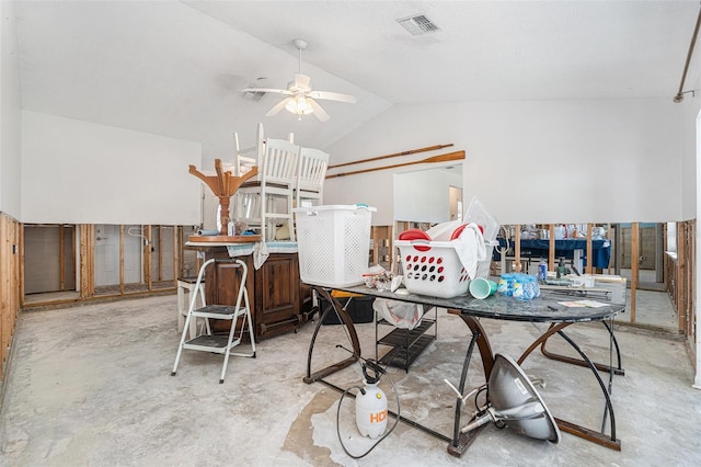 interior space with concrete flooring, lofted ceiling, visible vents, and a ceiling fan