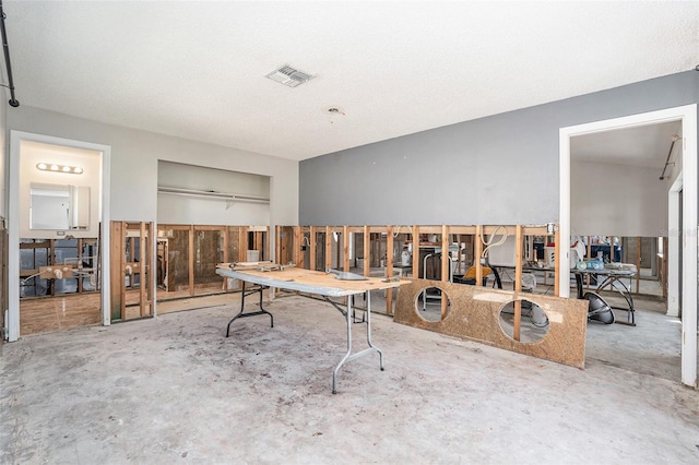 interior space featuring concrete flooring and visible vents