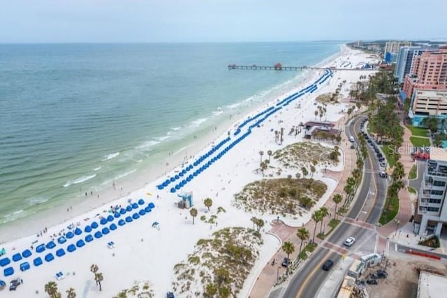 drone / aerial view with a view of the beach and a water view