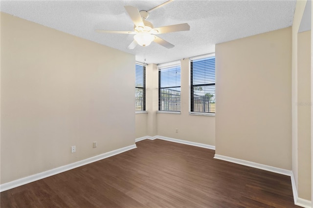 2073 Skimmer Ct W Unit 211, Clearwater, FL 33762 - spare room featuring baseboards, ceiling fan, a textured ceiling, and wood finished floors
