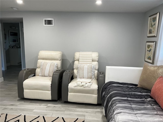 bedroom with visible vents and wood tiled floor