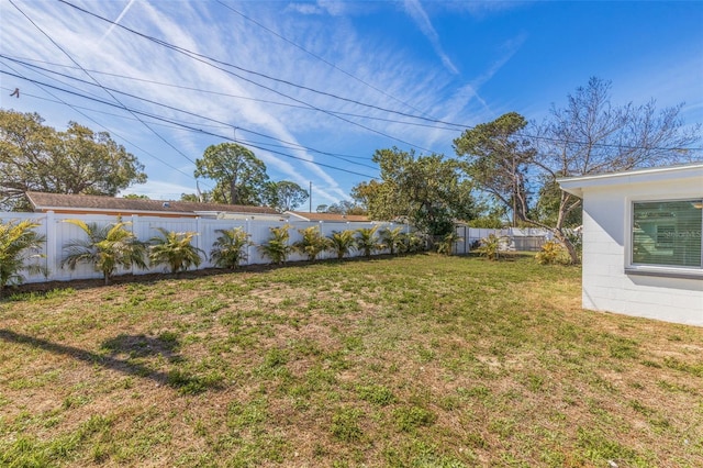 view of yard featuring a fenced backyard