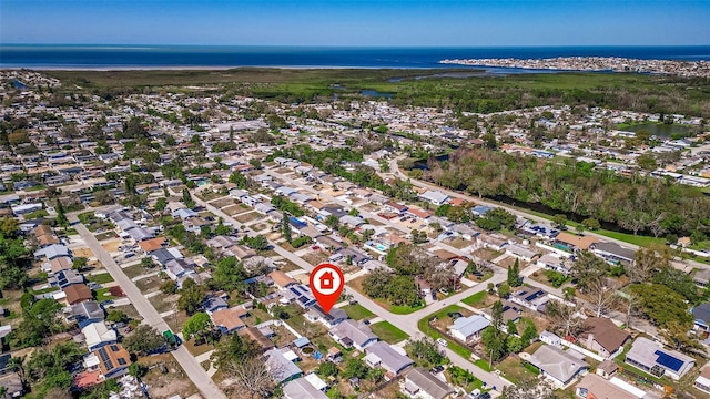 bird's eye view with a water view and a residential view