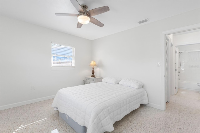 bedroom featuring ceiling fan, speckled floor, visible vents, and baseboards