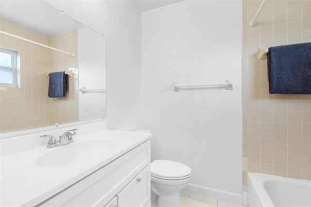 full bath with tile patterned flooring, toilet, vanity, baseboards, and washtub / shower combination