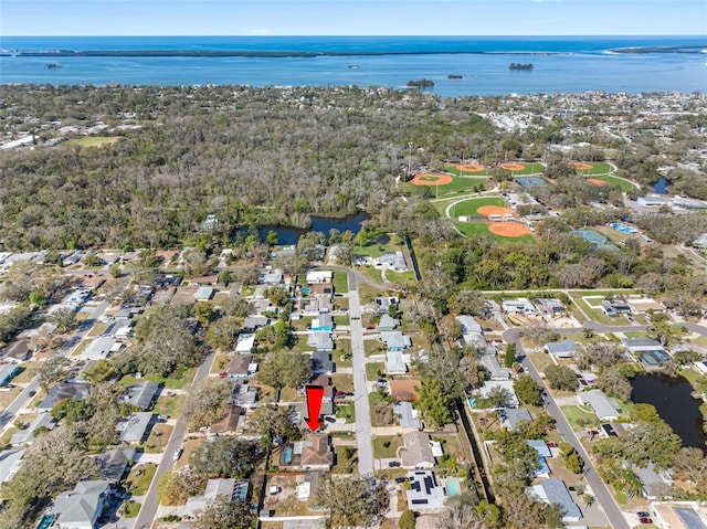 bird's eye view with a water view and a residential view