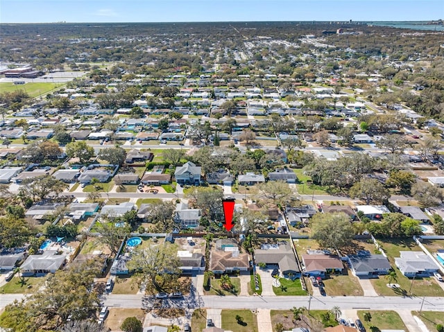 birds eye view of property with a residential view