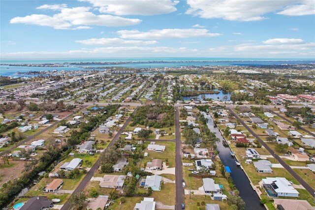 829 E 4th St, Englewood, FL 34223 - aerial overview of property's location with nearby suburban area and a large body of water
