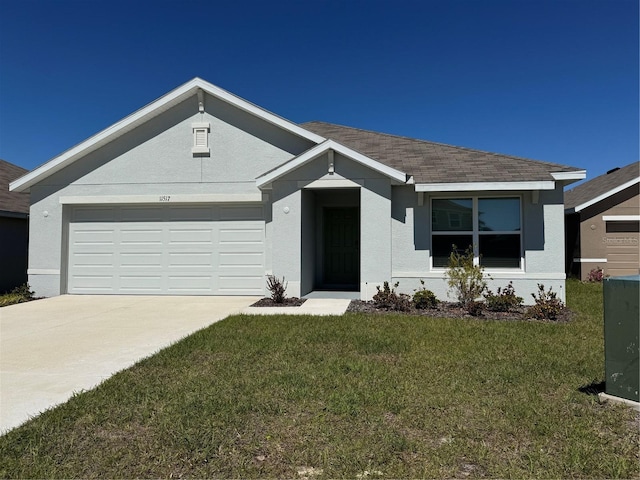 single story home featuring a garage, stucco siding, concrete driveway, and a front yard