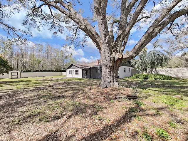 view of yard featuring fence