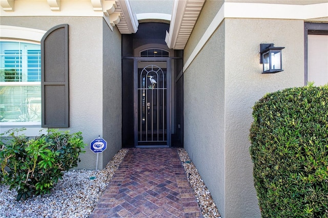 328 Siena Vista Pl, Sun City Center, FL 33573 - property entrance with stucco siding