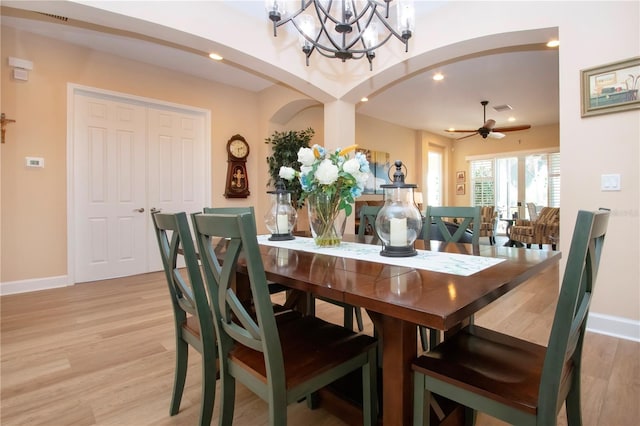 328 Siena Vista Pl, Sun City Center, FL 33573 - dining space with light wood-style floors, ceiling fan with notable chandelier, baseboards, and recessed lighting