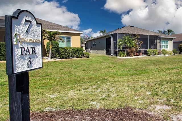 328 Siena Vista Pl, Sun City Center, FL 33573 - exterior space with a front lawn and stucco siding