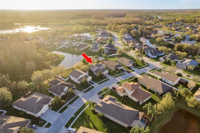 aerial view with a water view and a residential view