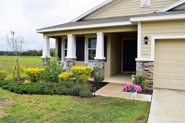 view of exterior entry with a porch, stone siding, and roof with shingles