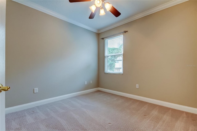 unfurnished room with baseboards, ceiling fan, ornamental molding, and light colored carpet