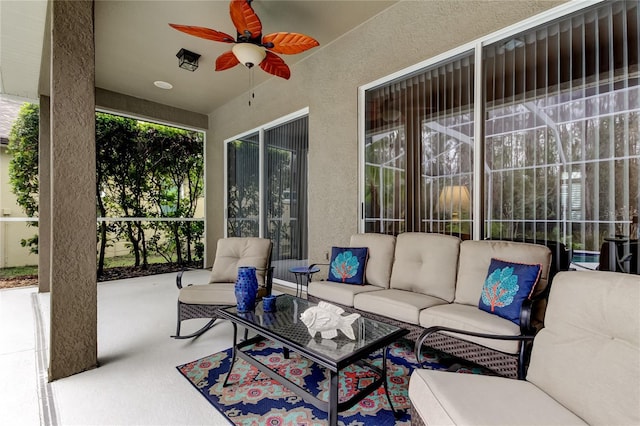 view of patio featuring an outdoor hangout area and a ceiling fan