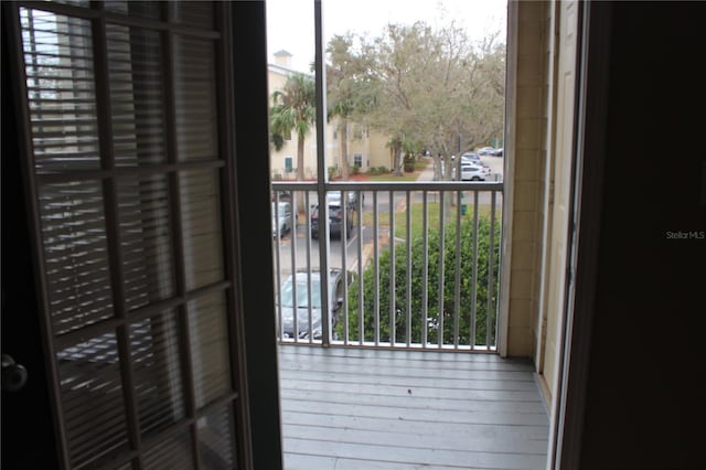 doorway to outside featuring hardwood / wood-style flooring