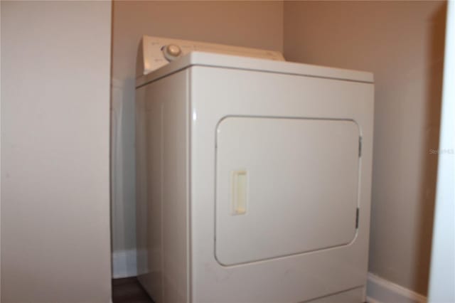 washroom with washer / dryer