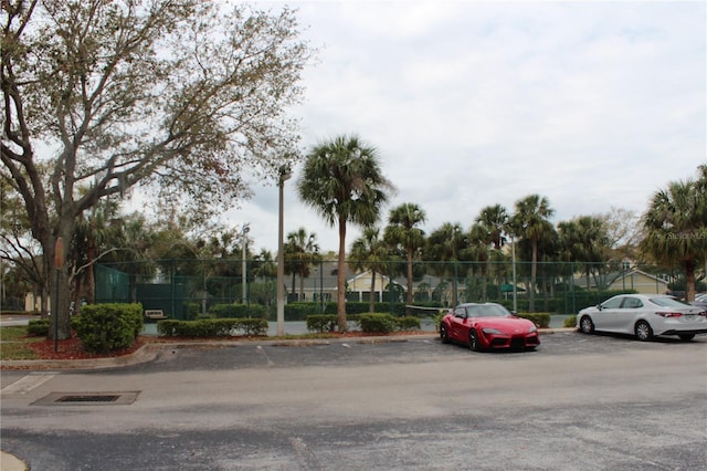 uncovered parking lot with fence