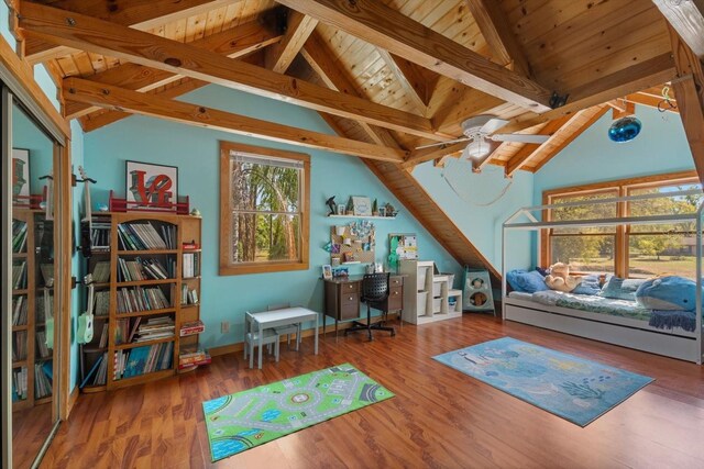 interior space featuring wooden ceiling, lofted ceiling with beams, wood finished floors, and ceiling fan