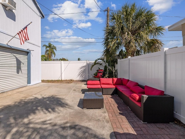 view of patio / terrace with outdoor lounge area and a fenced backyard