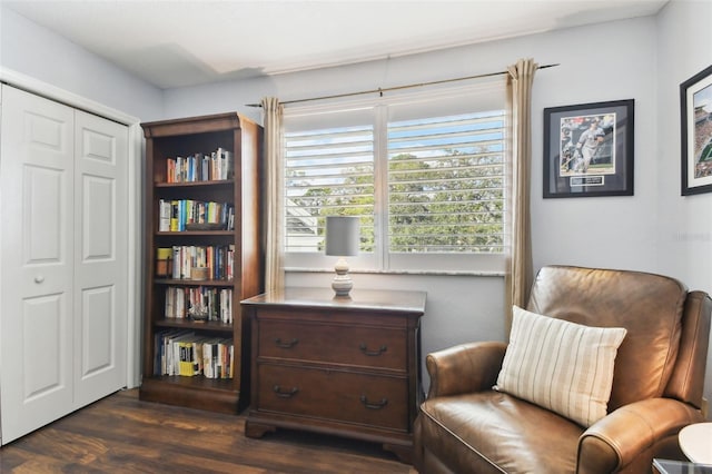 sitting room with dark wood finished floors