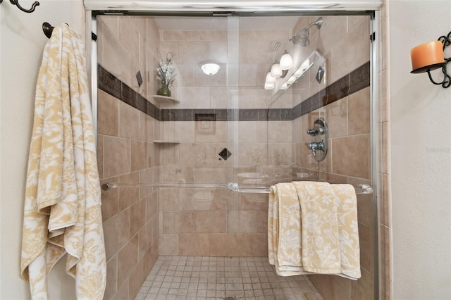 bathroom featuring a shower stall