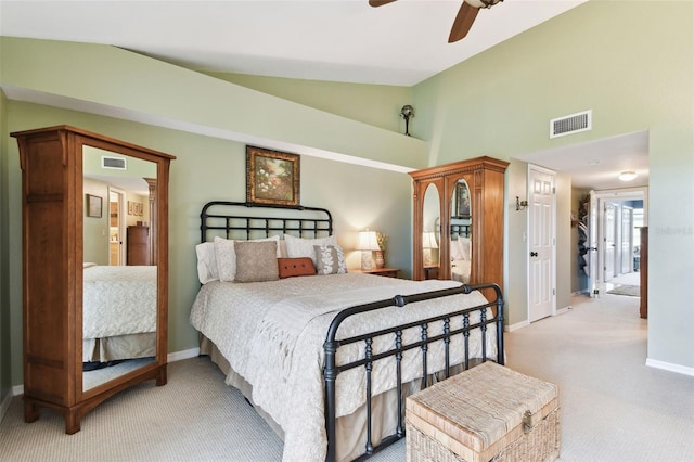 bedroom with light carpet, ceiling fan, visible vents, and baseboards