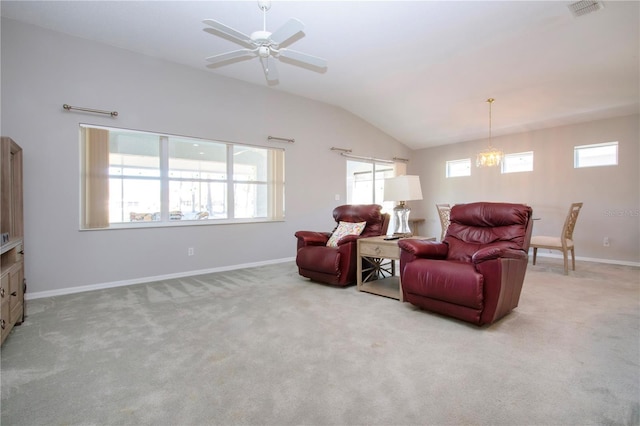 living room with visible vents, baseboards, lofted ceiling, carpet flooring, and ceiling fan with notable chandelier