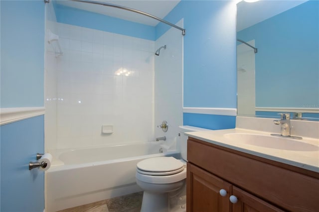 bathroom with vanity, toilet, and shower / bathtub combination