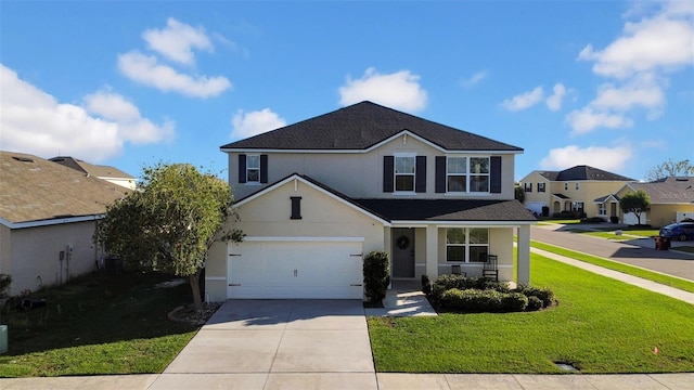 traditional-style home featuring covered porch, driveway, a front yard, and stucco siding